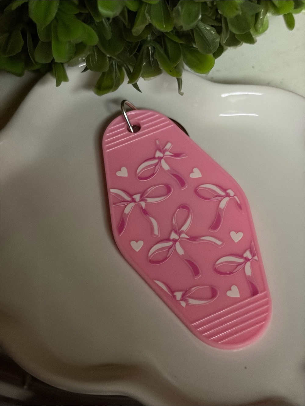 Pink bow embellished key chain